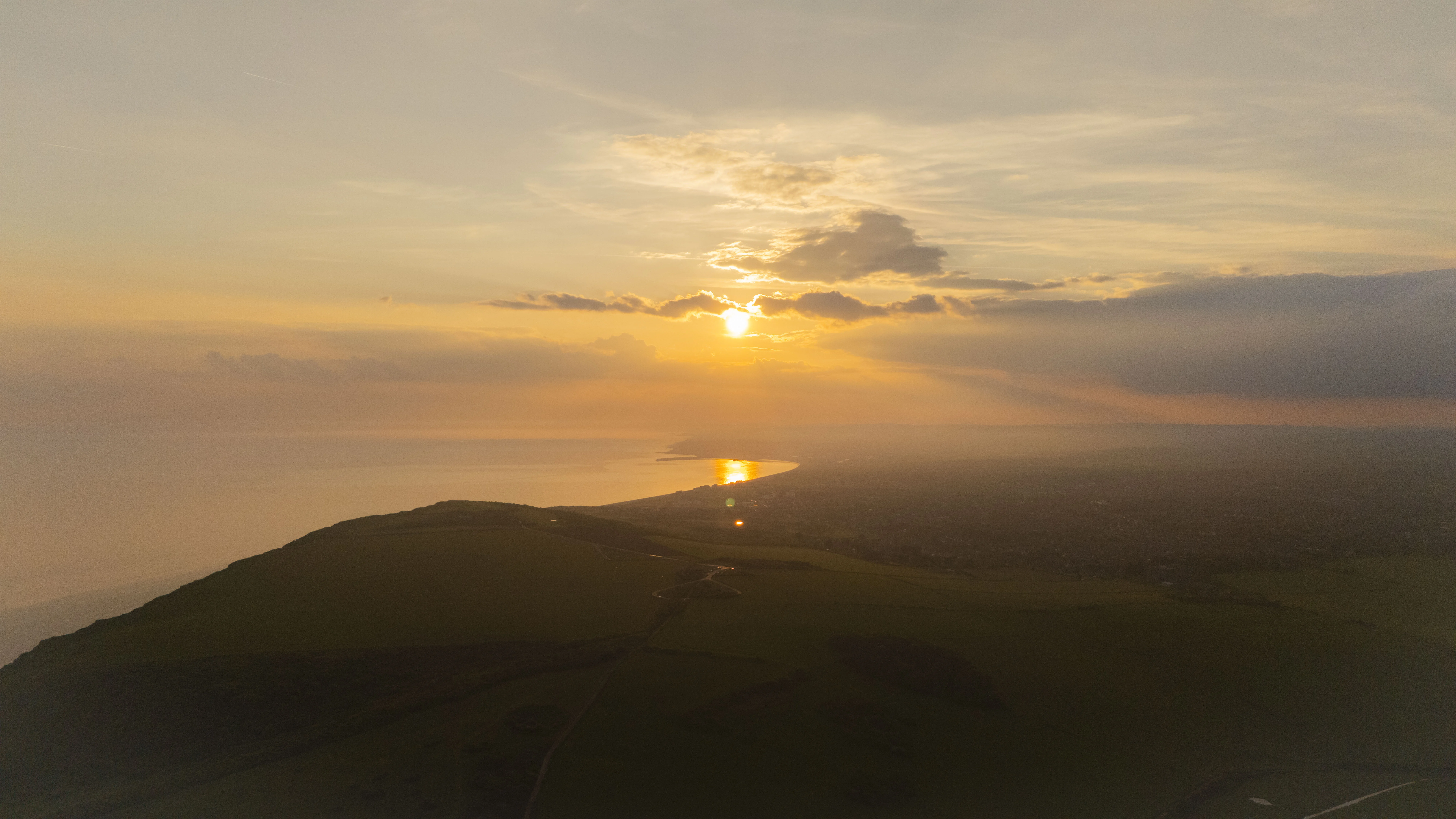 Beautiful sunset - setting over the English Channel, beachy head catching the ray of sunshine